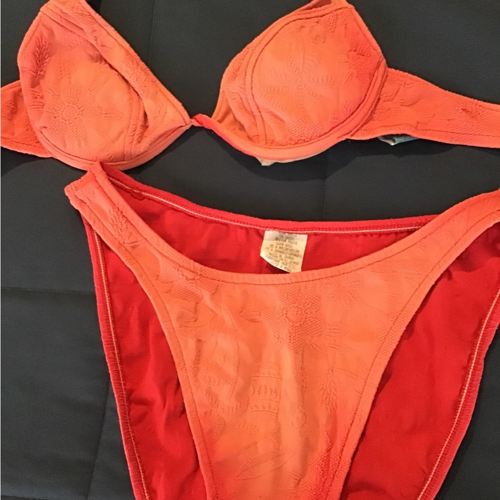 Bikini. Oldie, but goodie! Faded/ Bleached color in spot… still a great suit!